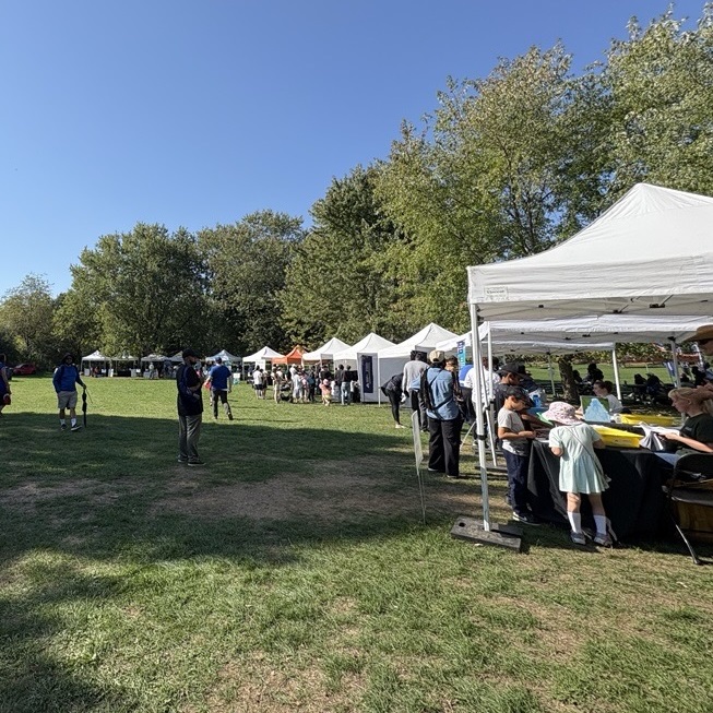 visitors to the TRCA Adventures of Salmon event at Morningside Park explore the many interactive booths