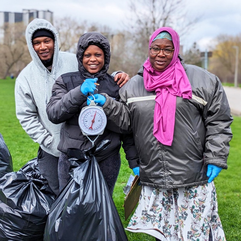 community members take part in an Earth Week clean-up event