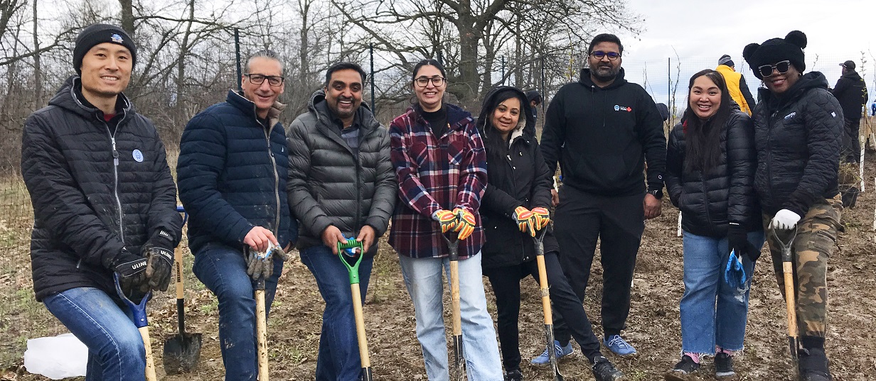 community members take part in an Earth Day planting event