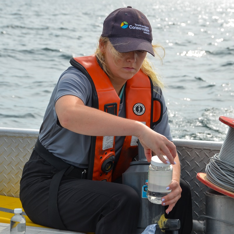 a TRCA team member conducts water quality monitoring on the Lake Ontario waterfront in Ajax