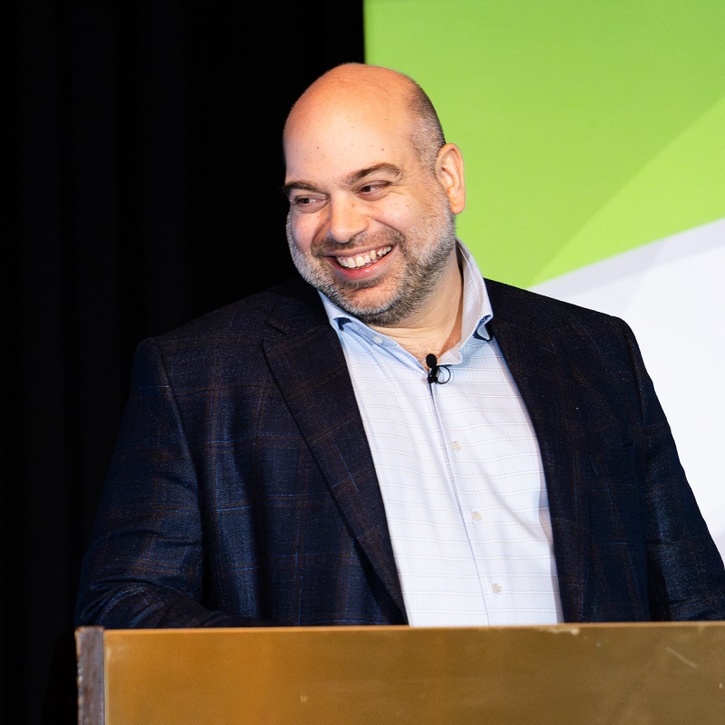 a speaker delivers a presentation at the annual Source to Stream conference