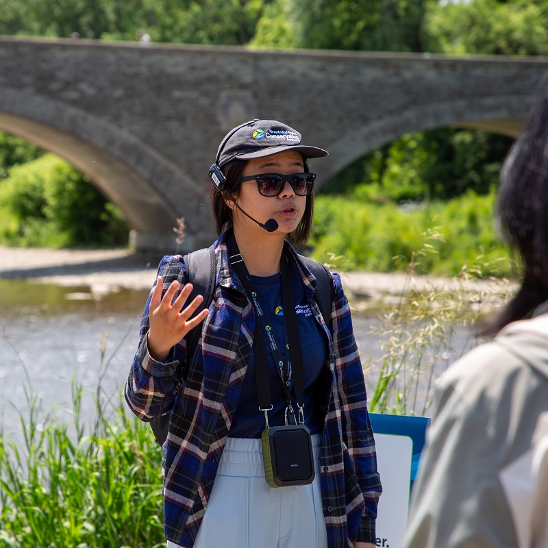 a TRCA team member leads a guided walk along the river at the Celebrate the Humber event