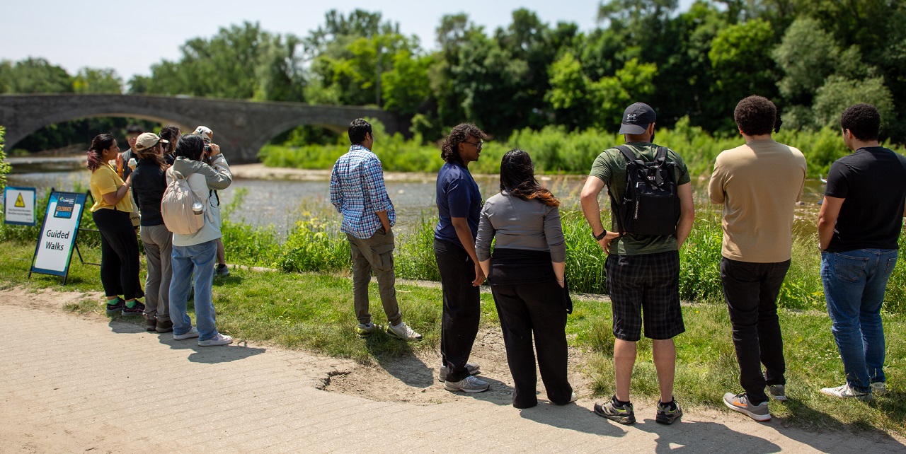 visitors to the TRCA Celebrate the Humber event enjoy a view of the historic river from the trail at Etienne Brule Park