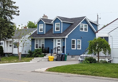 a residential street in the Ridgewood Victory Village neighbourhood in Malton