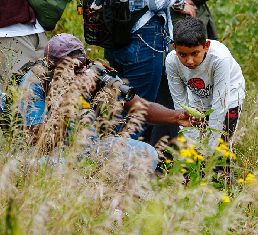 community members explore the trails at Tommy Thompson Park during the annual butterfly festival