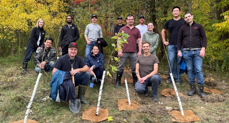 community volunteers plant native trees and shrubs at Jaffarys Creek Pond