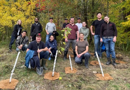 community volunteers plant native trees and shrubs at Jaffarys Creek Pond