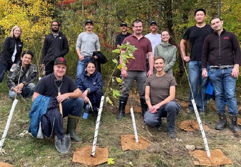 community volunteers plant native trees and shrubs at Jaffarys Creek Pond