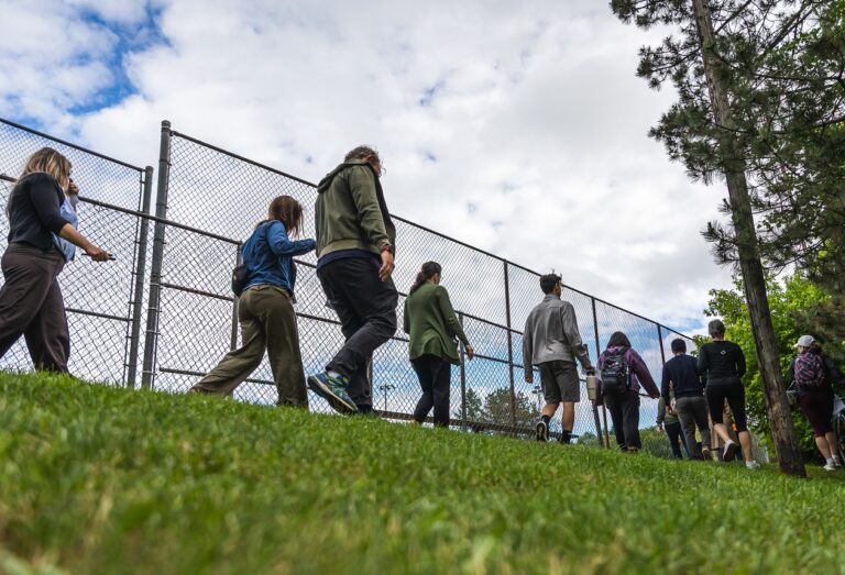community members enjoy a neigbhbourhood tour as they celebrate 10 years of the West Bolton SNAP program