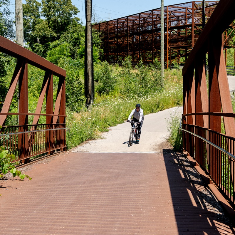 a cyclist on the East Don Trail