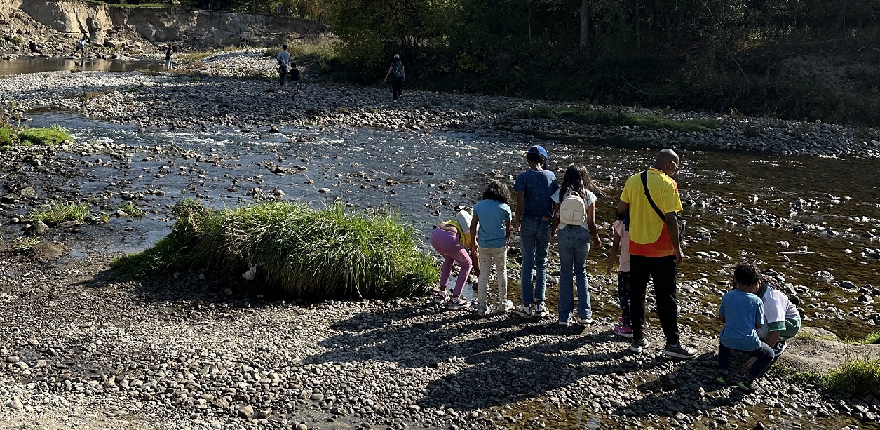 visitors at the TRCA adventures of salmon event enjoy a self-guided walk along a scenic stretch of Highland Creek in Scarborough