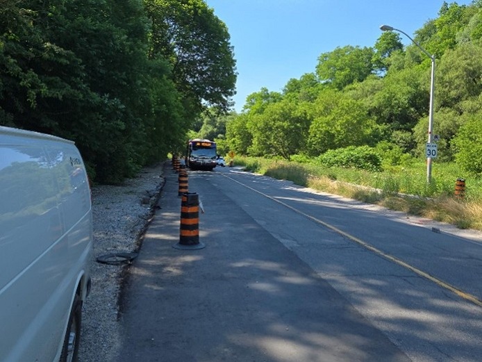 roadside works and traffic control measures at the Brimley Road South multi-use trail construction site
