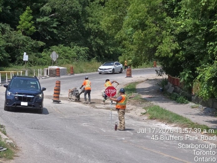 roadside works and traffic control measures at the Brimley Road South multi-use trail construction site
