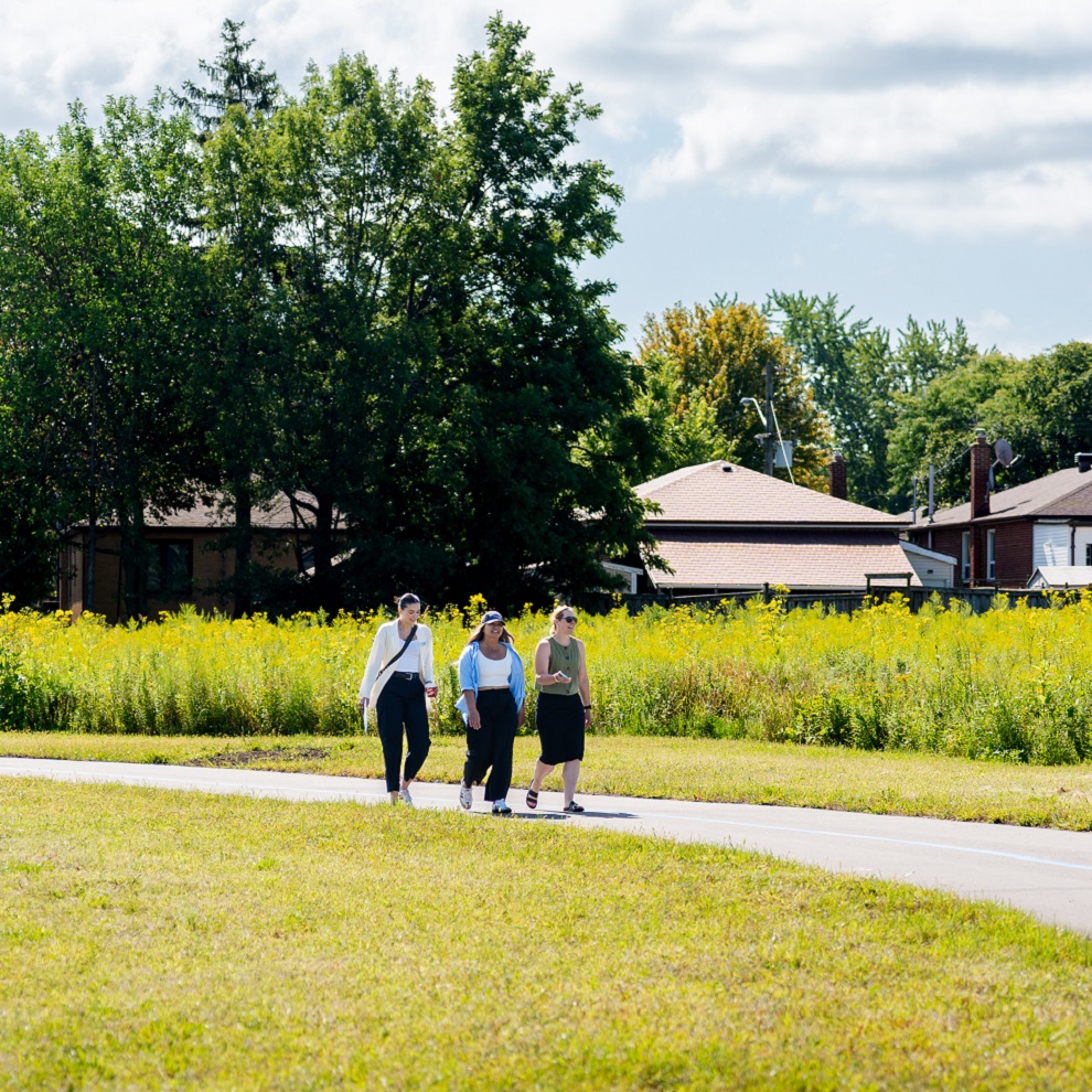 pedestrians explore the newly opened section 3 of The Meadoway