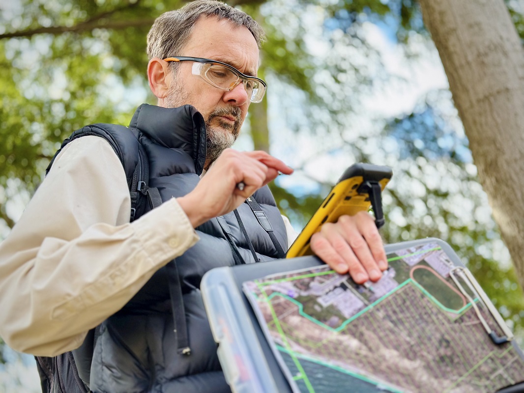 a TRCA biologist monitors spring ephemerals in the field
