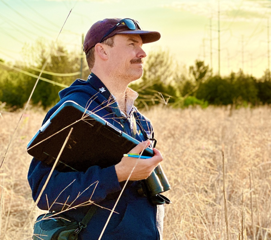 a TRCA biologist conducts bird monitoring in The Meadoway
