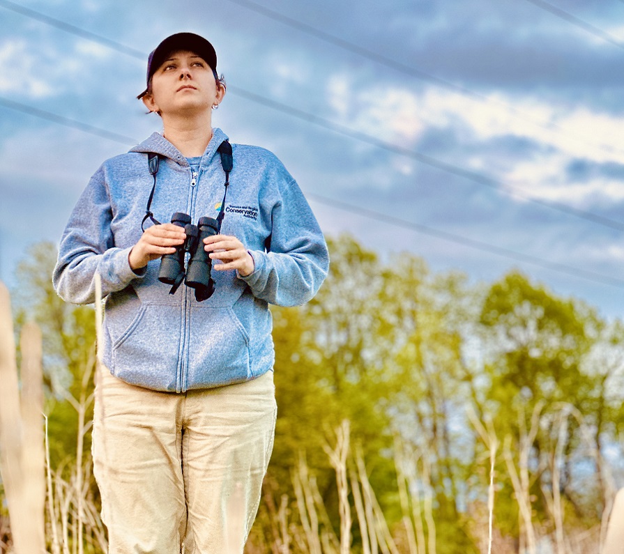 a TRCA biologist conducts bird monitoring in The Meadoway