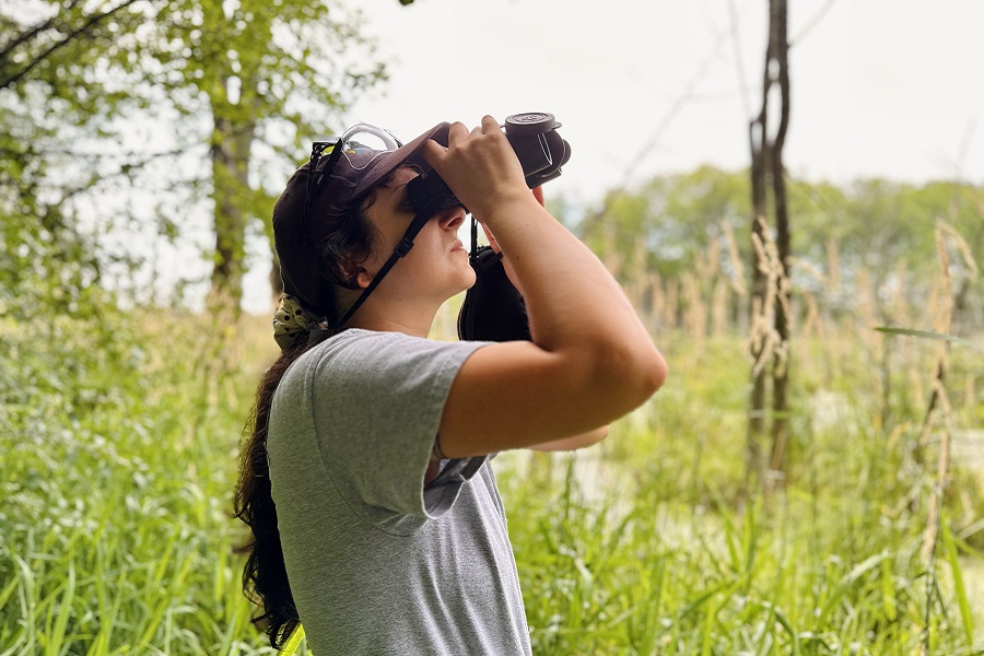 a TRCA biologist conducts bird monitoring in the field