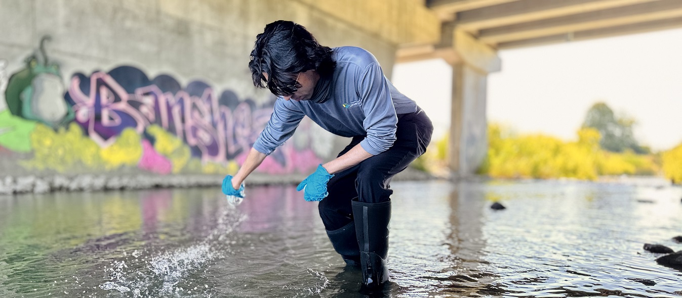 a member of the TRCA water quality team conducts monitoring in the field